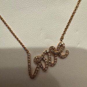 Elegant Gold and Diamond Love Necklace